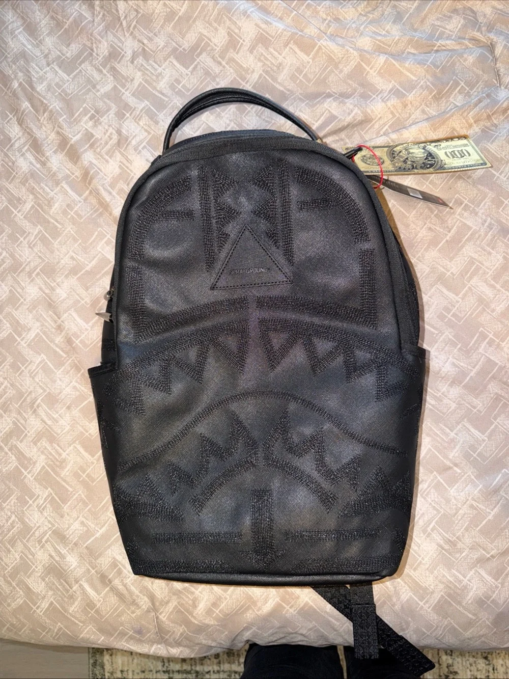 Sprayground Black Embossed African Intelligence Backpack